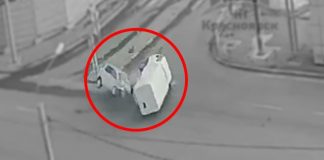 Иномарка влетела в грузовик в Красноярске. Обе машины перевернулись. Видео